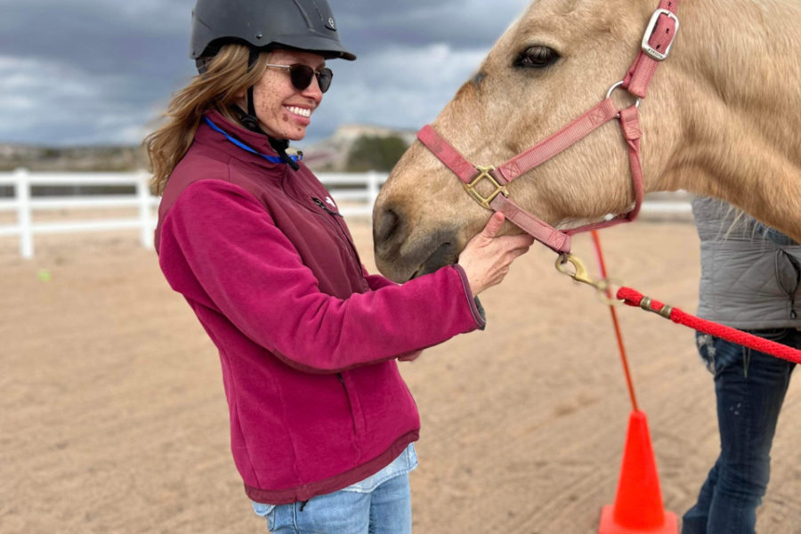 The resident Ranchers learn to work with horses during the Epona program. Leading the horses through obstacles helps the horses to exercise and teaches the ranchers communicate effectively to through this style of equestrian therapy