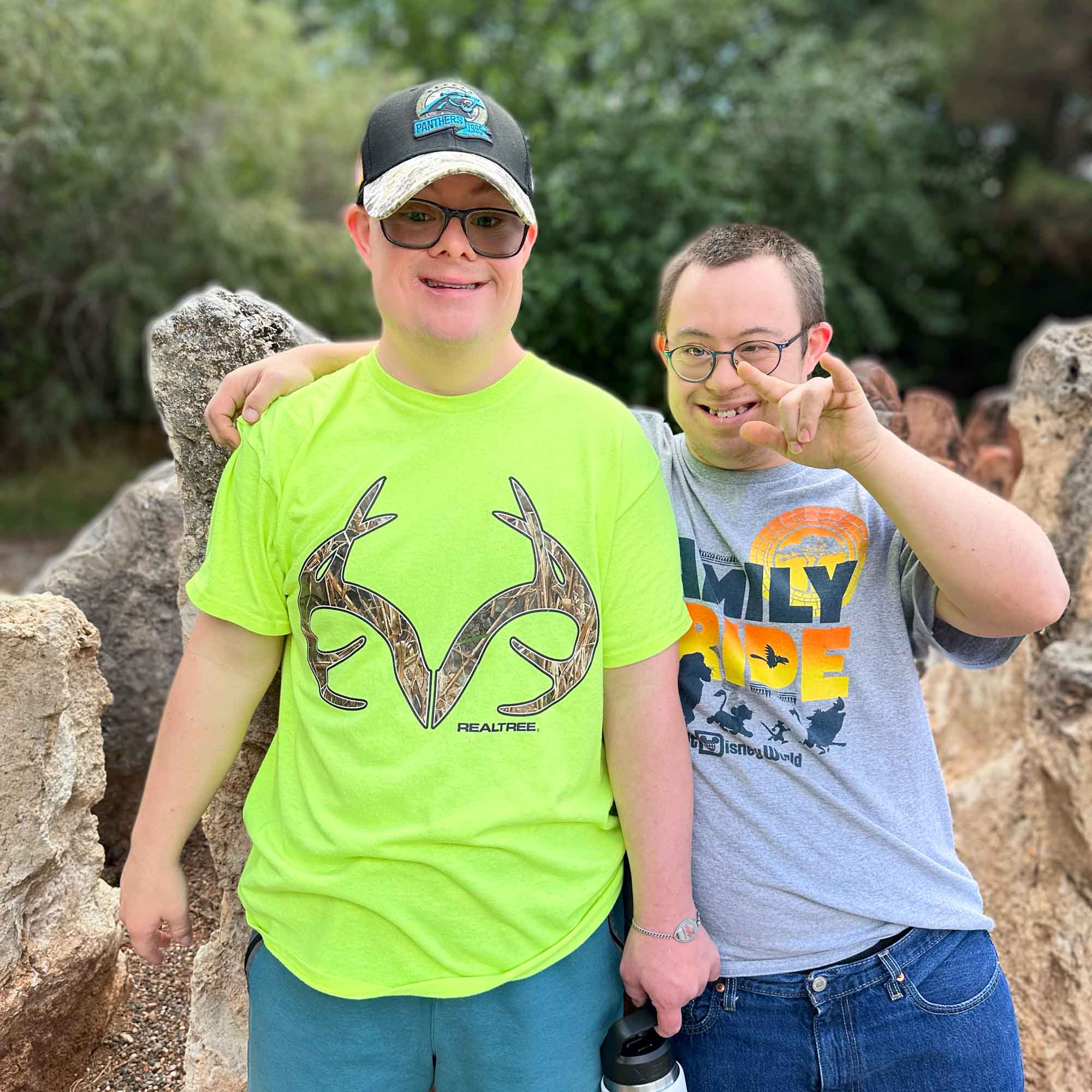 Charlie and Ty pose for a picture on an outing with Rainbow Acres